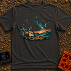 Stars Stripes And RVs - T-Shirt in Graphite - An illustration of an RV parked in a desert landscape at dusk under a...