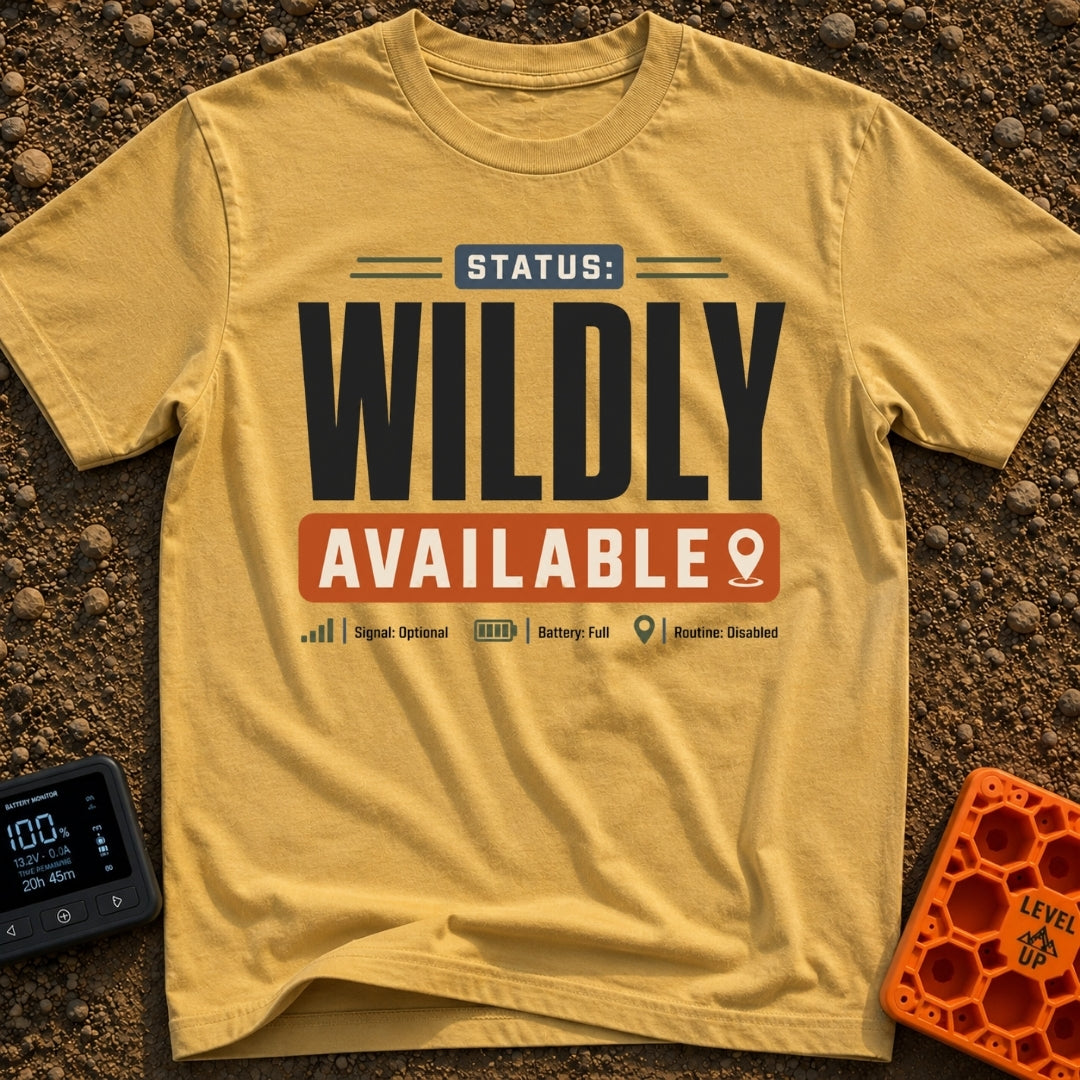 Wildly Available Status - T-Shirt in Mustard - A typographic design featuring the text "STATUS: WILDLY AVAILABLE" stacked...