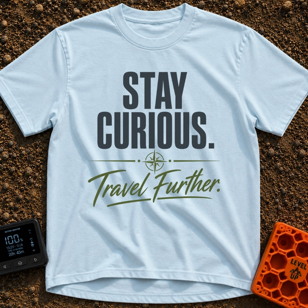 Curiosity Travels Further - T-Shirt in Chambray - A typographic design featuring the words "STAY CURIOUS." in large, dark...
