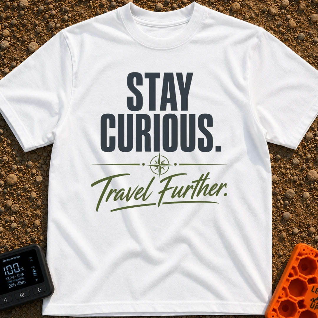 Curiosity Travels Further - T-Shirt in White - A typographic design featuring the words "STAY CURIOUS." in large, dark...