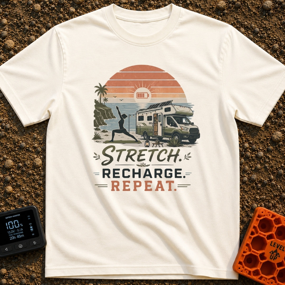 Stretch And Recharge - T-Shirt in Ivory - A silhouette of a woman doing a yoga pose on a mat beside an RV camper parked...