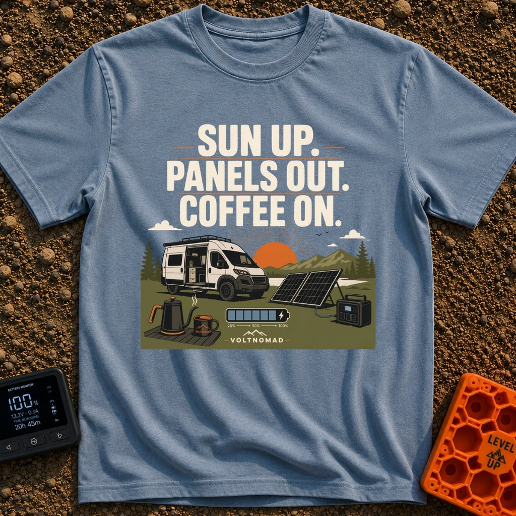 Panels Out Coffee On - T-Shirt in Blue Jean - A white camper van is parked with its side door open near a lake and...