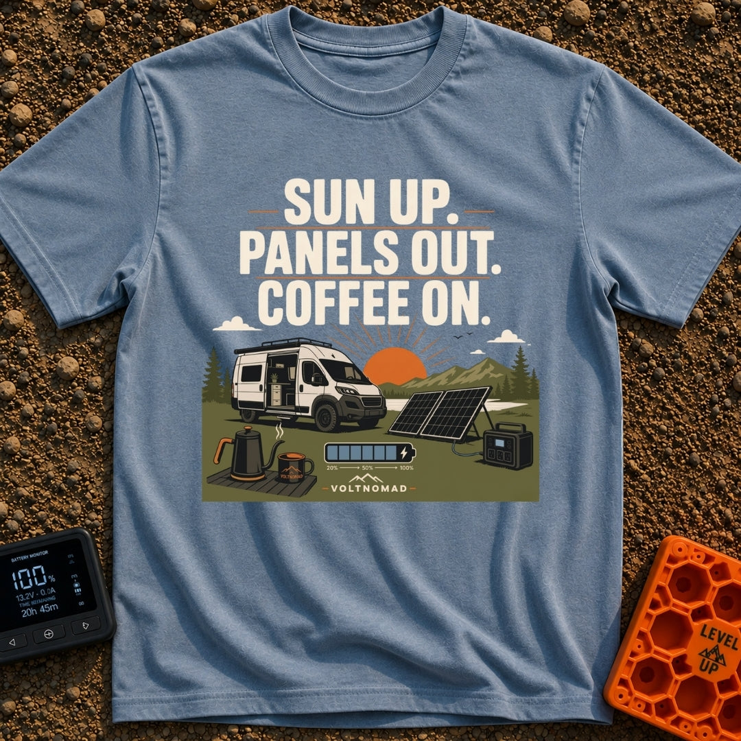 Panels Out Coffee On - T-Shirt in Blue Jean - A white camper van is parked with its side door open near a lake and...