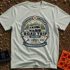 Relationship Milestone Unlocked - T-Shirt in Bay - A badge-style design featuring a white camper van parked in front of...