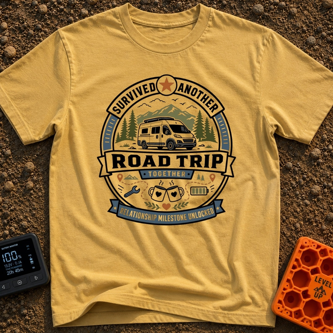 Relationship Milestone Unlocked - T-Shirt in Mustard - A badge-style design featuring a white camper van parked in front...