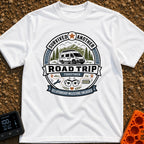 Relationship Milestone Unlocked - T-Shirt in White - A badge-style design featuring a white camper van parked in front of...