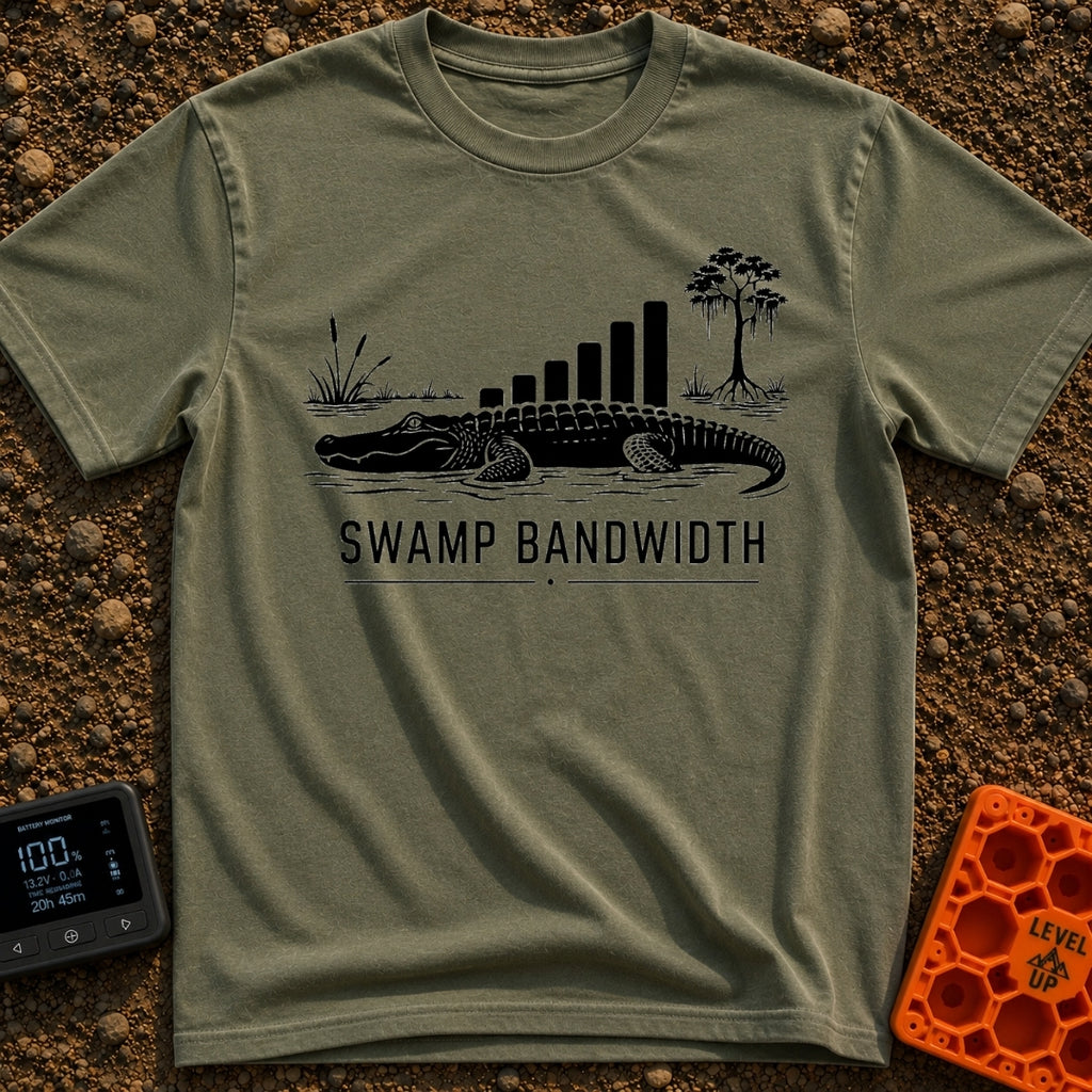 Buffering In The Bayou - T-Shirt in Moss - A black and white illustration of an alligator in water with swamp vegetation,...