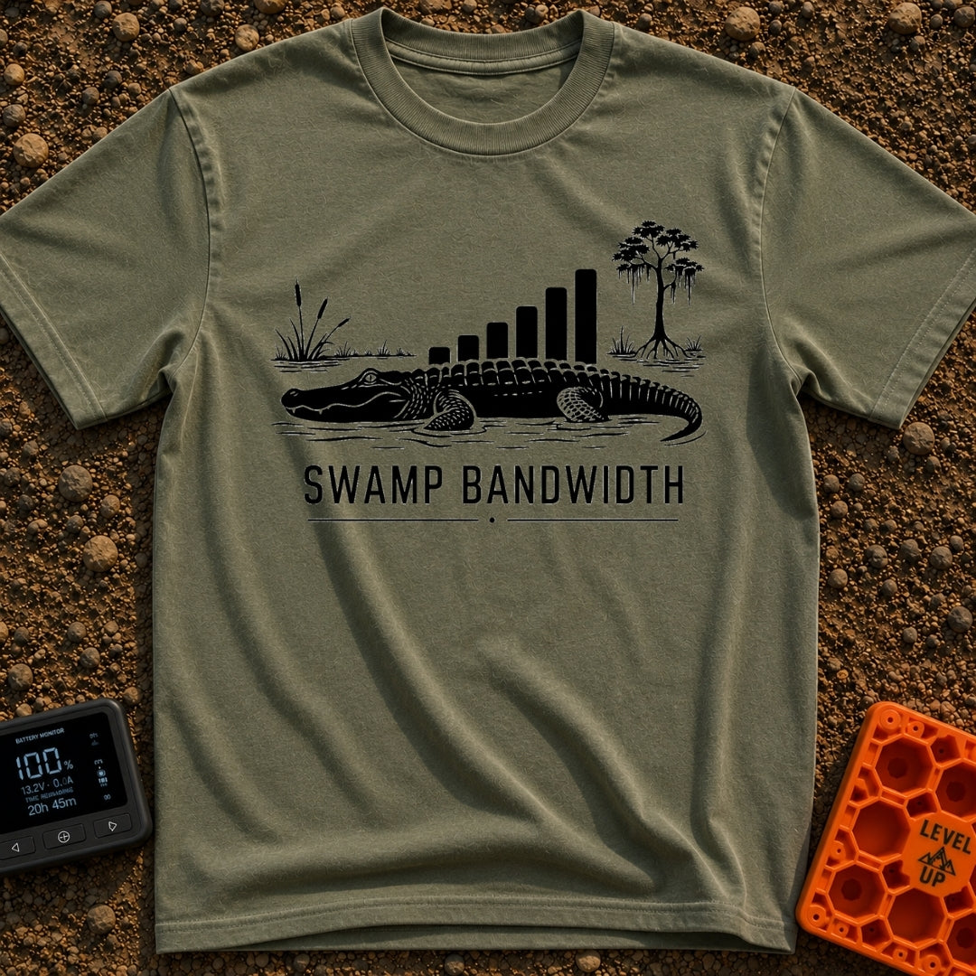 Buffering In The Bayou - T-Shirt in Moss - A black and white illustration of an alligator in water with swamp vegetation,...