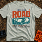 Road Ready Ish - T-Shirt in Bay - A typographic design with the text "SYSTEM CHECK: ROAD READY-ISH" above three checked...