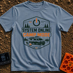 Camp Mode Activated - T-Shirt in Blue Jean - A badge-style illustration showing a camper van parked near a campfire and...