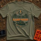 Camp Mode Activated - T-Shirt in Moss - A badge-style illustration showing a camper van parked near a campfire and an...