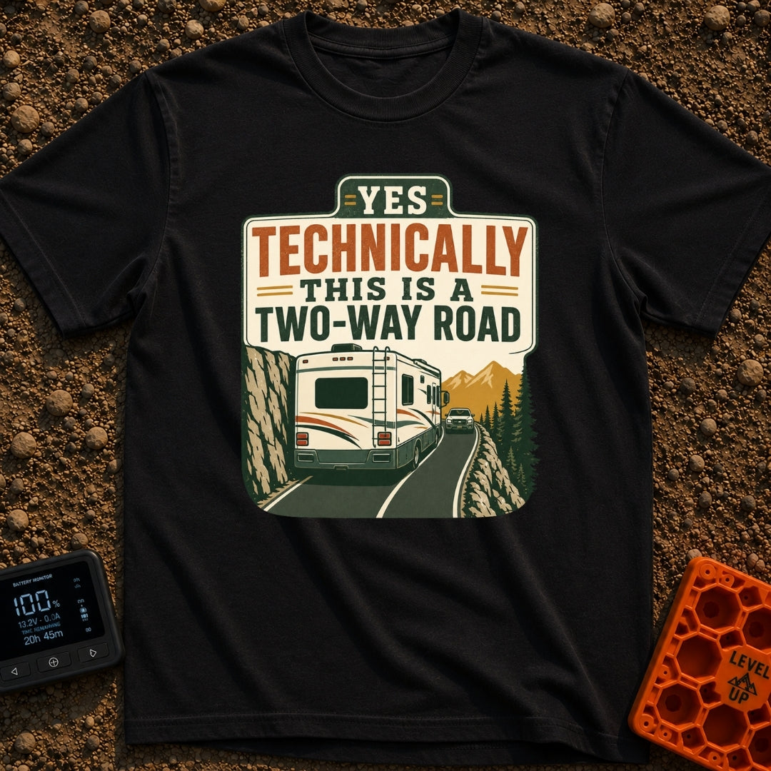 Technically Two Way - T-Shirt in Black - A vintage-style illustration of a large motorhome driving on a narrow mountain...
