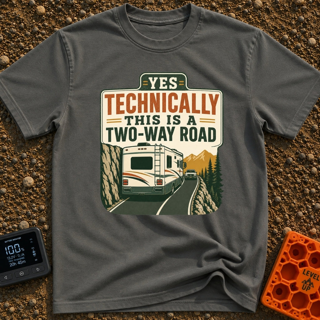 Technically Two Way - T-Shirt in Pepper - A vintage-style illustration of a large motorhome driving on a narrow mountain...