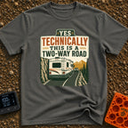 Technically Two Way - T-Shirt in Pepper - A vintage-style illustration of a large motorhome driving on a narrow mountain...