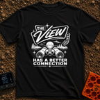 Naturally Well Connected - T-Shirt in Black - A black and white illustration of binoculars resting in the foreground with...