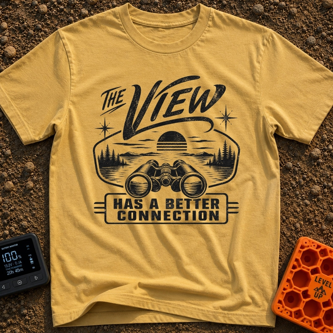 Naturally Well Connected - T-Shirt in Mustard - A black and white illustration of binoculars resting in the foreground...