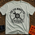 Five Minute Fix - T-Shirt in Bay - A circular, distressed emblem featuring a crossed wrench and screwdriver behind a...