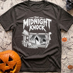 Fear The Knock - T-Shirt in Graphite - A black and white illustration looking from the inside of a camper out the window,...