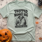 Rest In Fleece - T-Shirt in Bay - A black and white illustration of an undead skeleton trapped inside a zipped-up mummy...