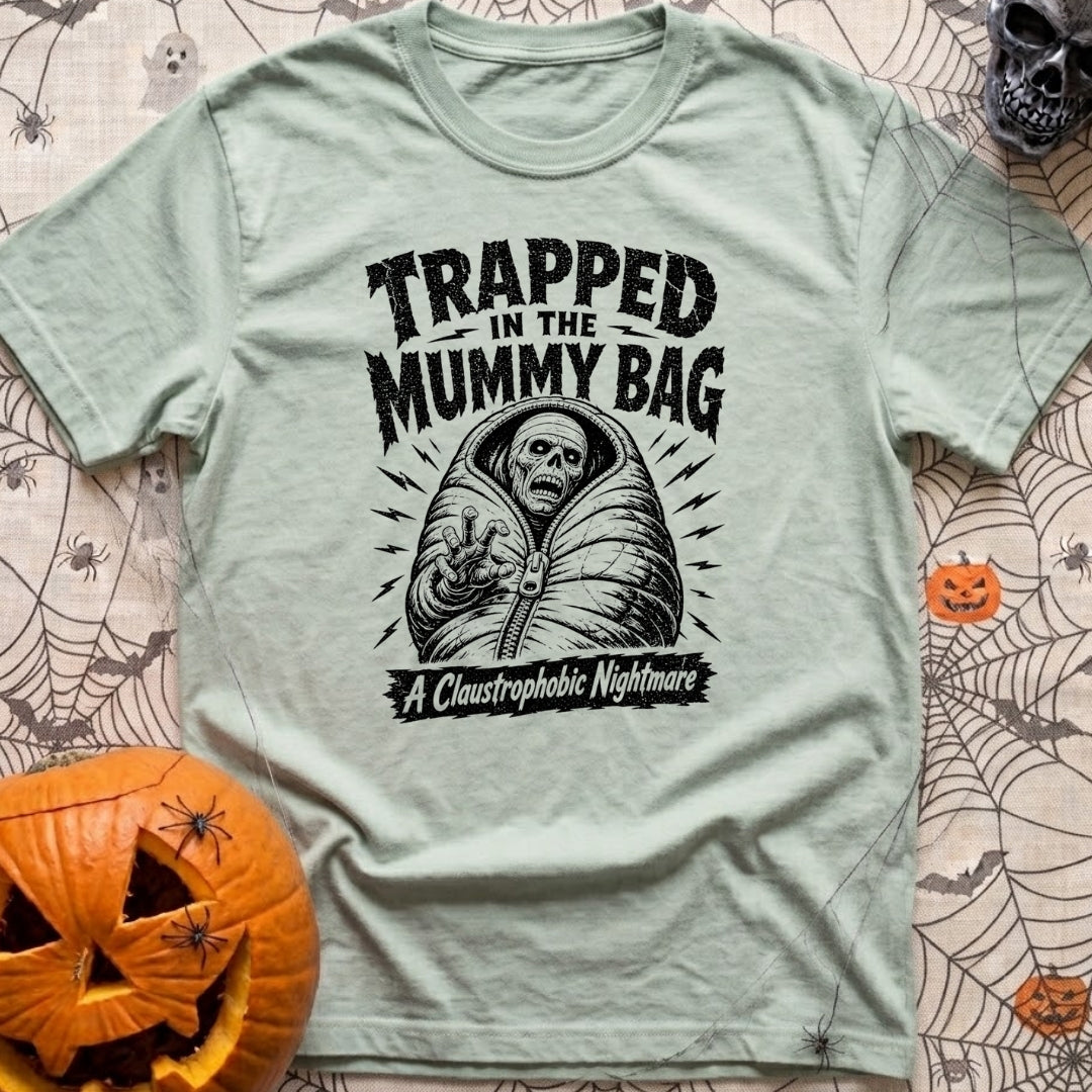 Rest In Fleece - T-Shirt in Bay - A black and white illustration of an undead skeleton trapped inside a zipped-up mummy...
