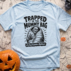 Rest In Fleece - T-Shirt in Chambray - A black and white illustration of an undead skeleton trapped inside a zipped-up...
