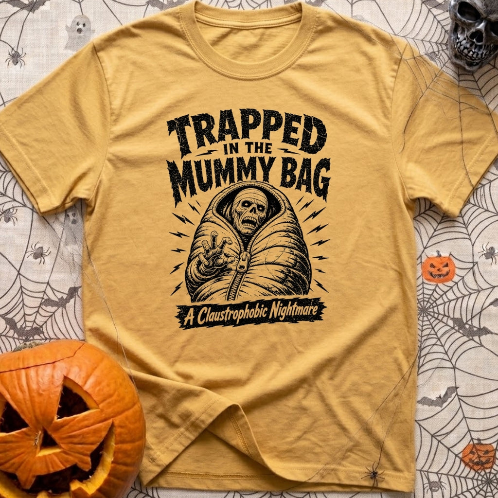 Rest In Fleece - T-Shirt in Mustard - A black and white illustration of an undead skeleton trapped inside a zipped-up...
