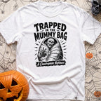 Rest In Fleece - T-Shirt in White - A black and white illustration of an undead skeleton trapped inside a zipped-up mummy...