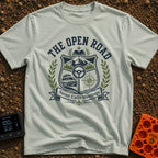 Roads Over Meetings - T-Shirt in Bay - A heraldic crest design featuring a mountain range with pine trees, a steering...