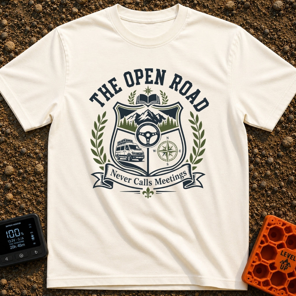 Roads Over Meetings - T-Shirt in Ivory - A heraldic crest design featuring a mountain range with pine trees, a steering...