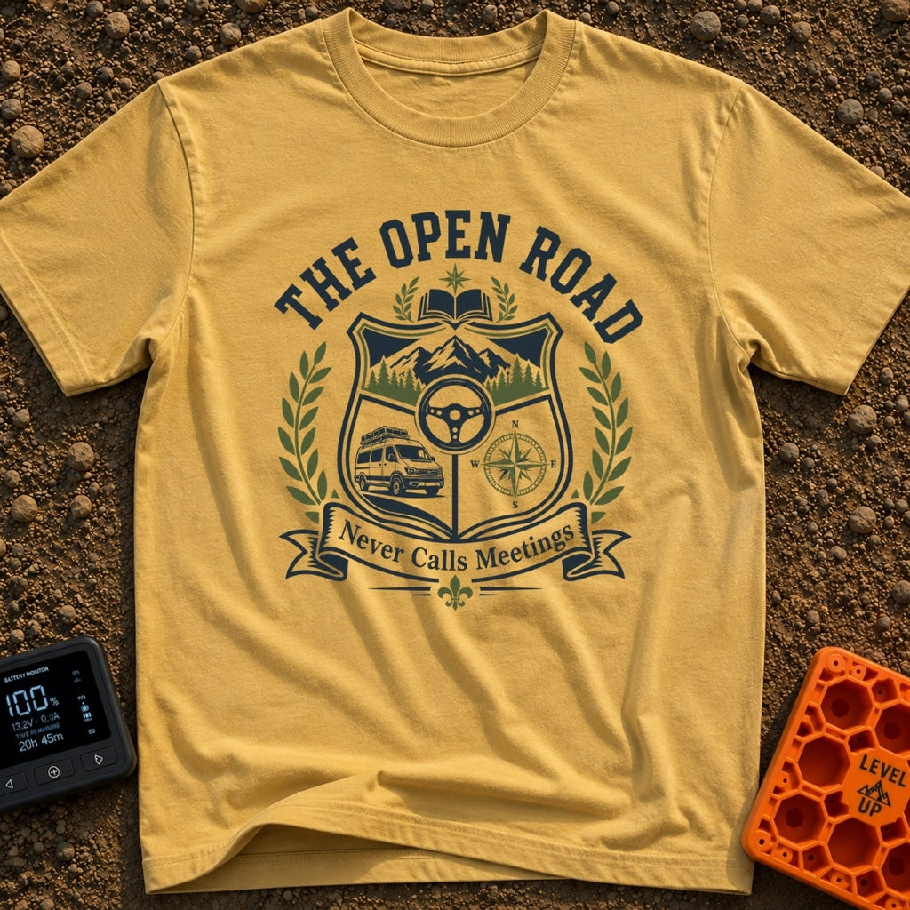 Roads Over Meetings - T-Shirt in Mustard - A heraldic crest design featuring a mountain range with pine trees, a steering...