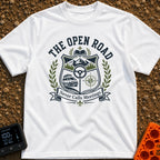 Roads Over Meetings - T-Shirt in White - A heraldic crest design featuring a mountain range with pine trees, a steering...