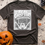Smore To The Story - T-Shirt in Graphite - The artwork features spooky-style text reading "THE REAL GHOST STORY" above a...