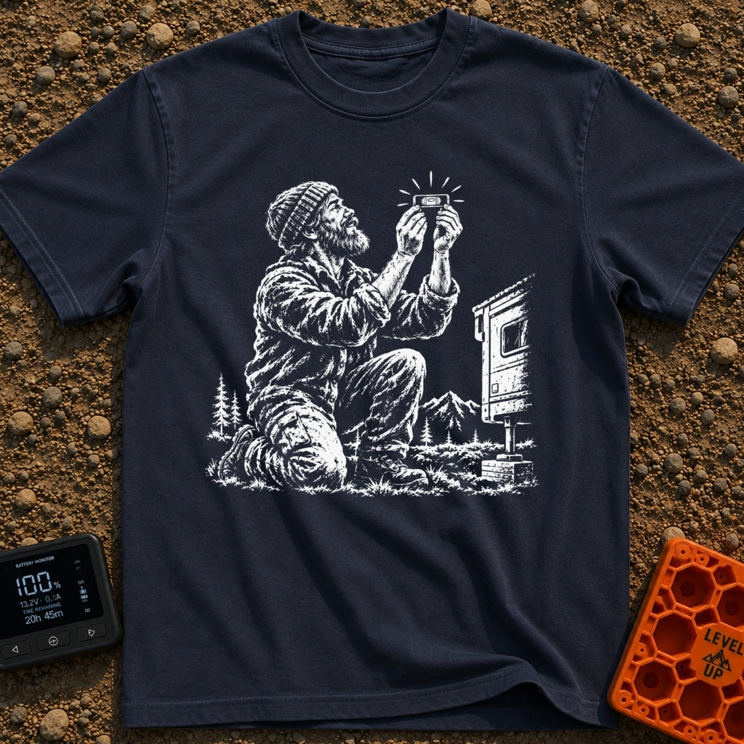 In Bubble We Trust - T-Shirt in Navy - A white line-art illustration showing a bearded man kneeling beside a camper...