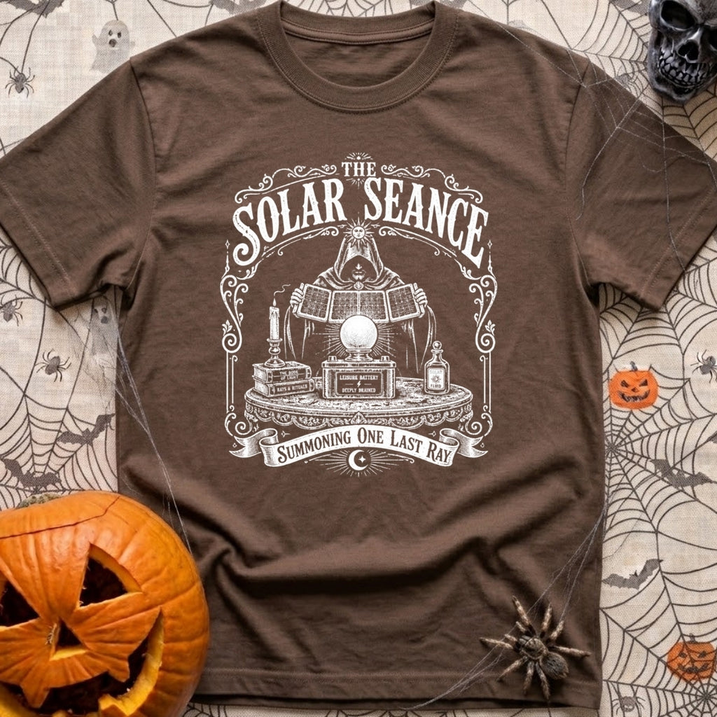 The Solar Seance - T-Shirt in Espresso - A vintage-style white line drawing of a hooded figure holding up foldable solar...