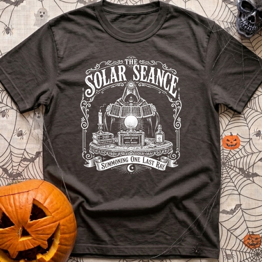 The Solar Seance - T-Shirt in Graphite - A vintage-style white line drawing of a hooded figure holding up foldable solar...