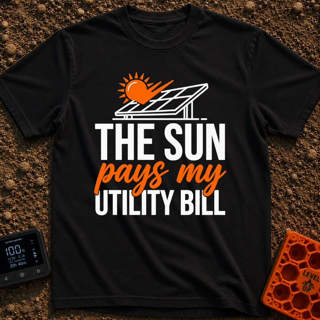 Sun Pays My Bills - T-Shirt in Black - A graphic featuring a stylized orange sun shining on a tilted solar panel. Below...