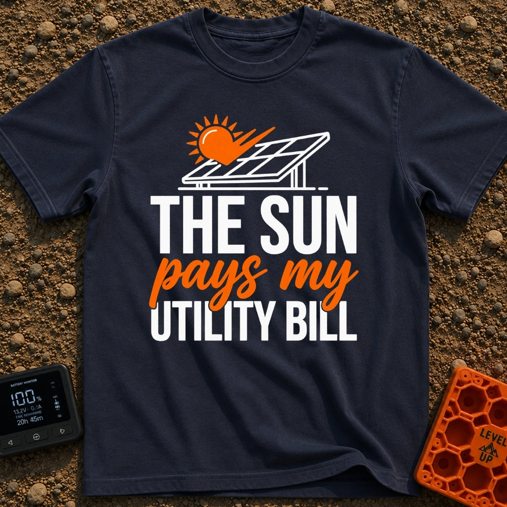 Sun Pays My Bills - T-Shirt in Navy - A graphic featuring a stylized orange sun shining on a tilted solar panel. Below...