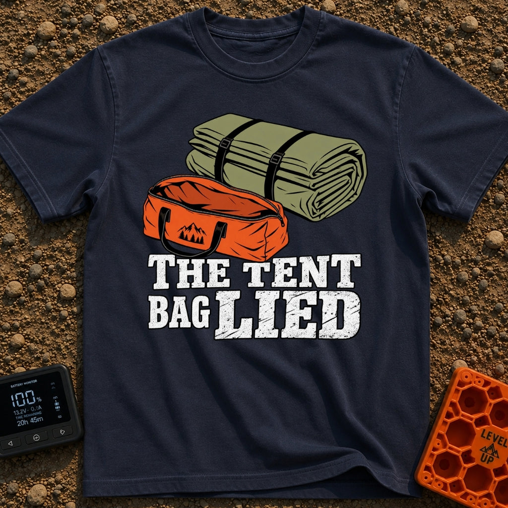 The Tent Bag Lied - T-Shirt in Navy - A graphic showing a large rolled-up green tent sitting next to a noticeably smaller...