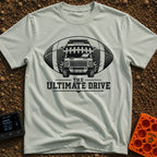 The Ultimate Drive - T-Shirt in Bay - A black and white illustration of a camper van breaking through the center of a...