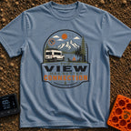Views Have Better Connection - T-Shirt in Blue Jean - An illustration of a white camper van parked by a mountain lake...