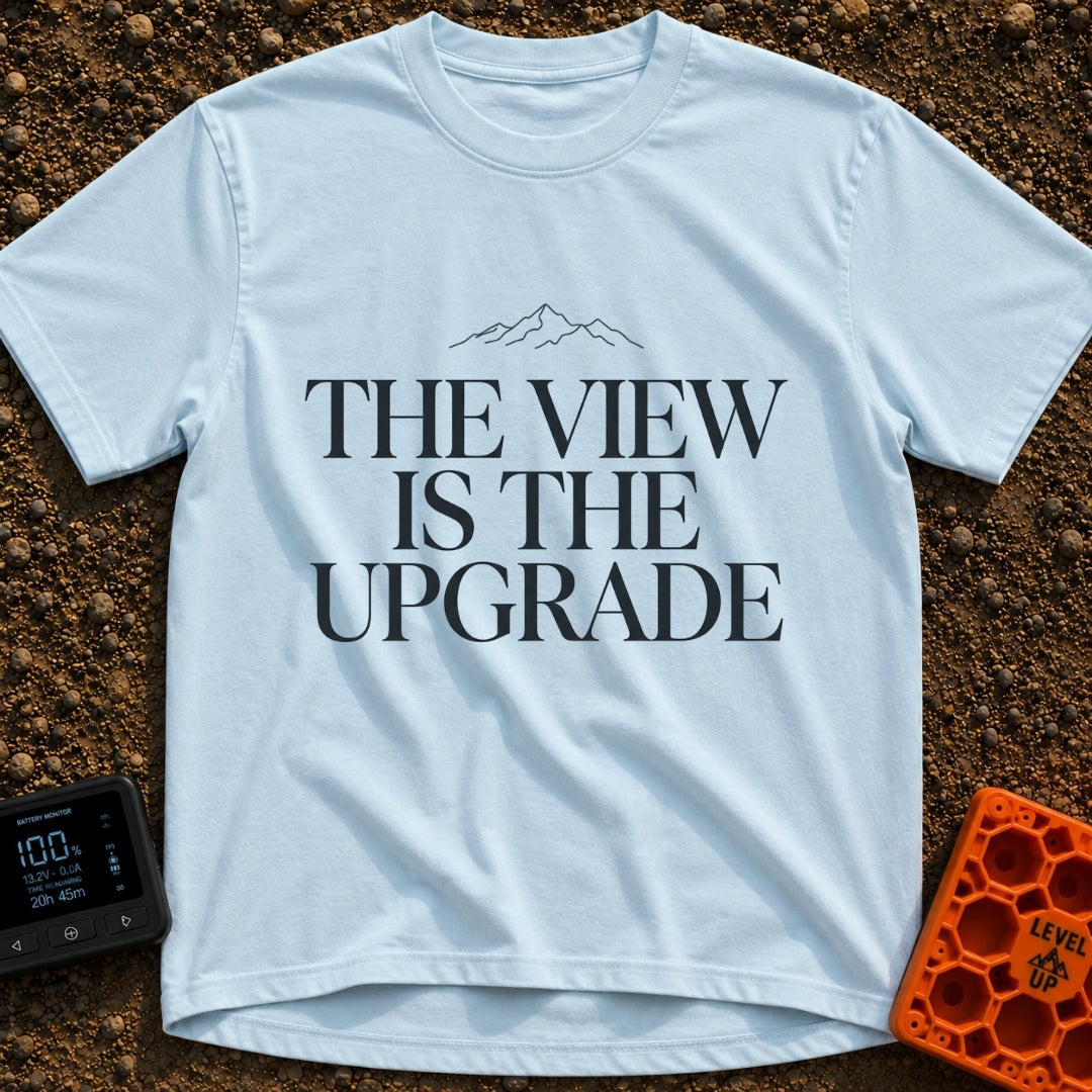 Upgrade To The View - T-Shirt in Chambray - A minimalist, text-focused design featuring the stacked phrase "THE VIEW IS...