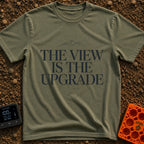 Upgrade To The View - T-Shirt in Moss - A minimalist, text-focused design featuring the stacked phrase "THE VIEW IS THE...