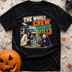 The Whole Crew Booked - T-Shirt in Black - A cartoon illustration featuring the text 'THE WHOLE CREW BOOKED SITE 13'...
