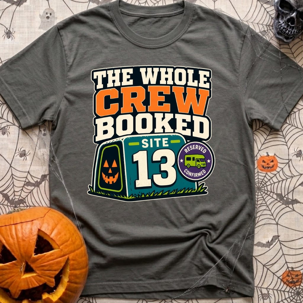 The Whole Crew Booked - T-Shirt in Pepper - A typographic design reading 'THE WHOLE CREW BOOKED', above a teal campsite...