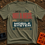 Just A Mobile System - T-Shirt in Moss - A text-based design reading "THIS IS NOT A MESS, IT'S A MOBILE SYSTEM" alongside...