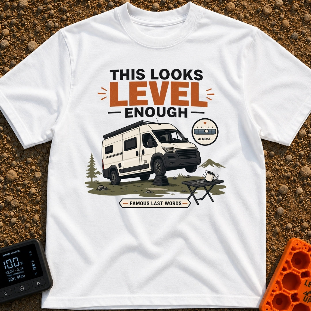 Leaning Tower Camper - T-Shirt in White - A cartoon illustration of a white camper van parked on uneven terrain with its...