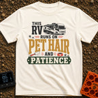 Pet Hair Express - T-Shirt in Ivory - A graphic featuring an illustration of a modern RV, scattered paw prints, a lint...