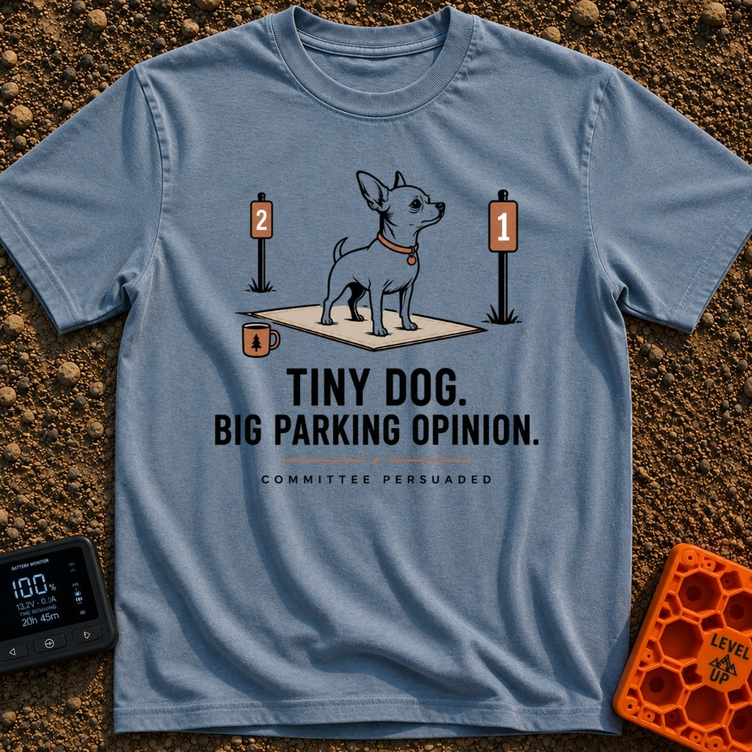 Pint-Sized Parking Critic - T-Shirt in Blue Jean - An illustration of a small dog standing on an outdoor mat between two...