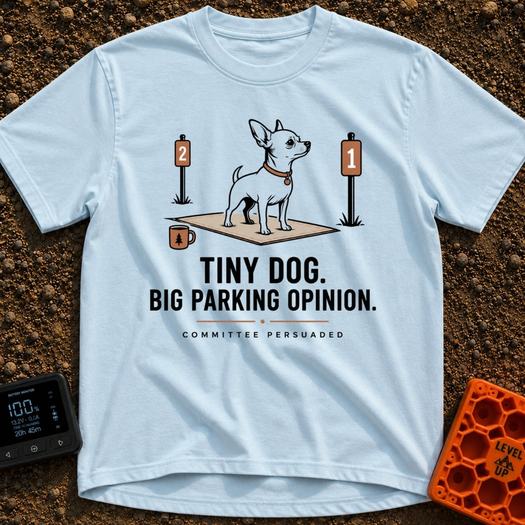 Pint-Sized Parking Critic - T-Shirt in Chambray - An illustration of a small dog standing on an outdoor mat between two...