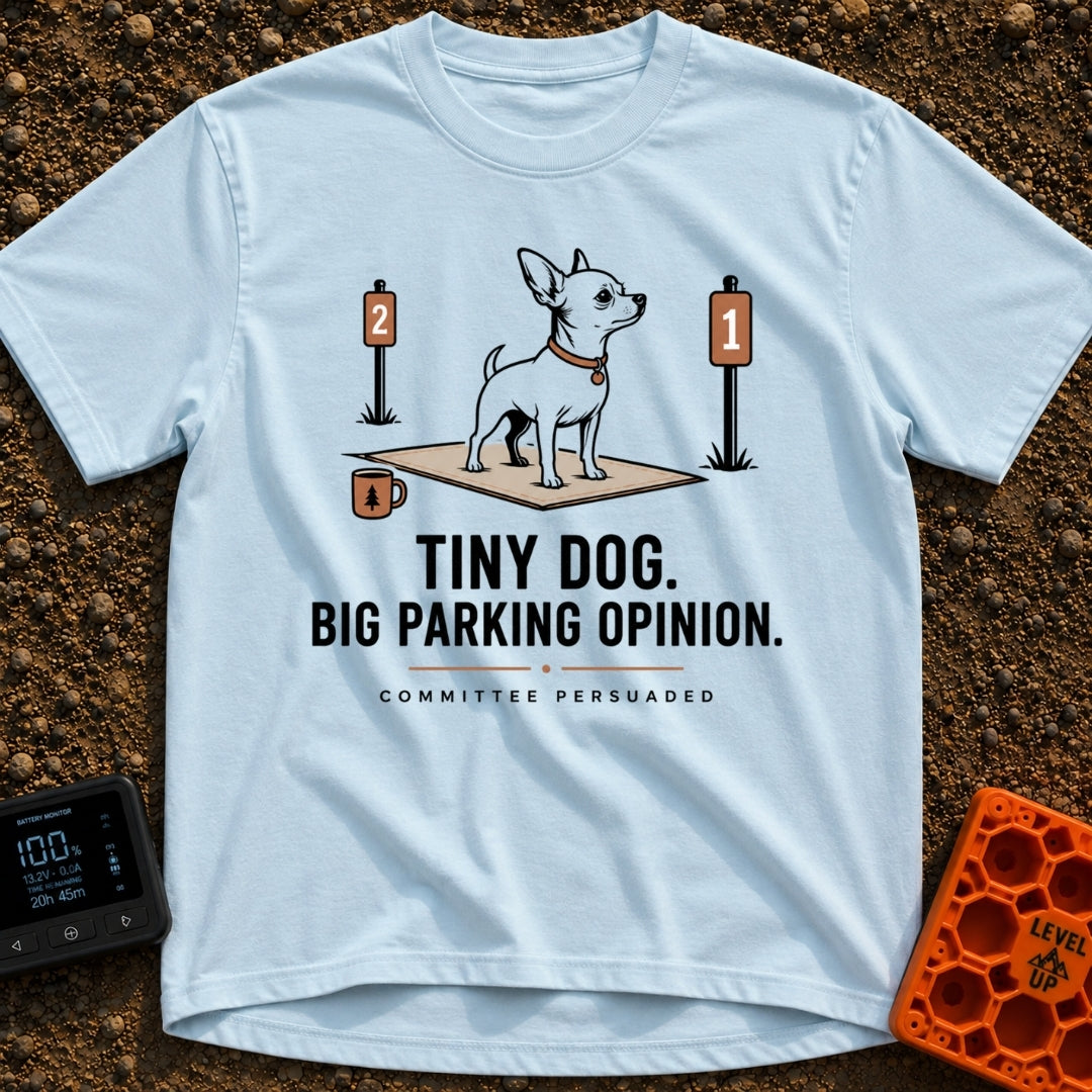 Pint-Sized Parking Critic - T-Shirt in Chambray - An illustration of a small dog standing on an outdoor mat between two...